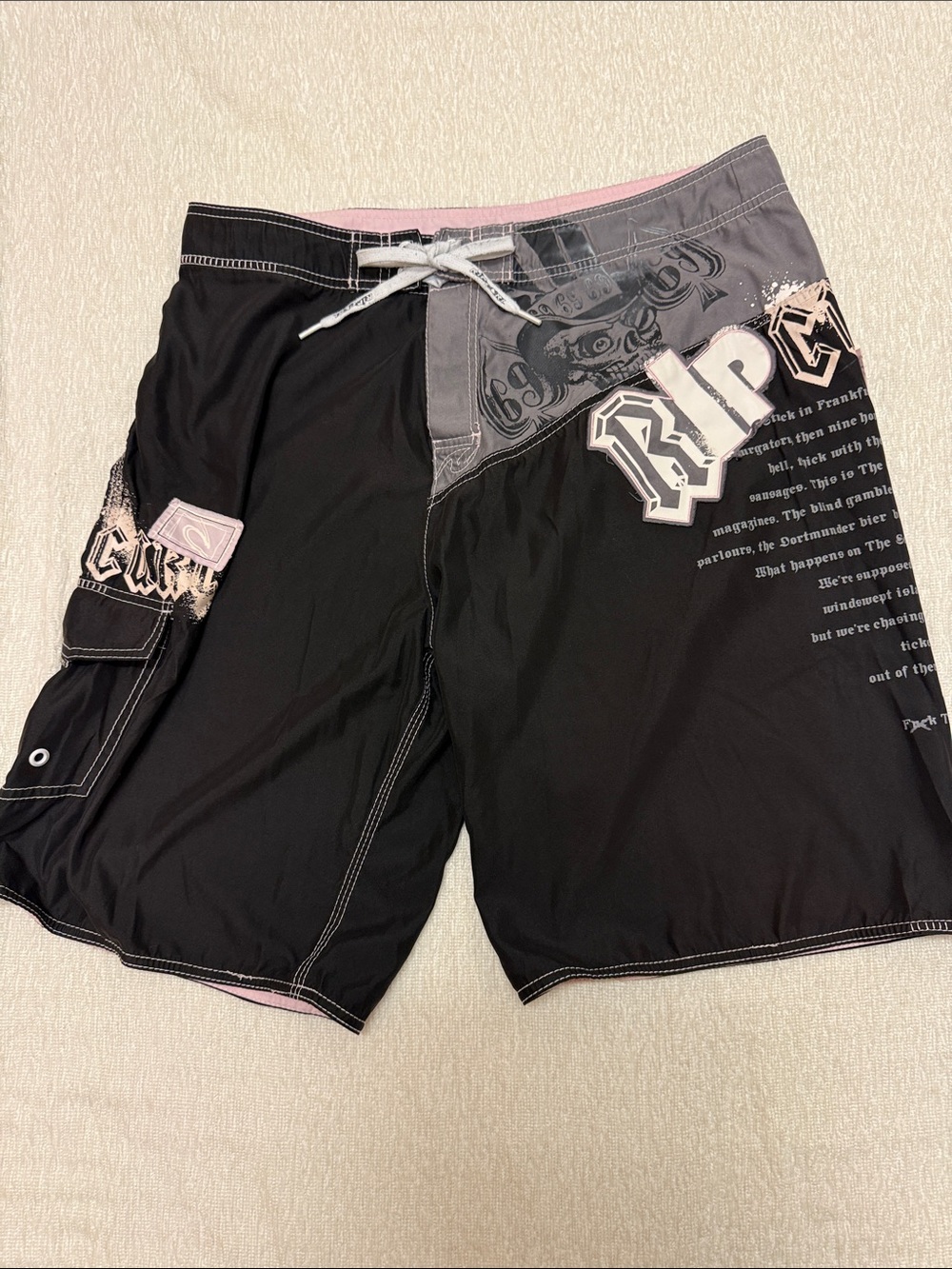 Rip Curl Black and Gray Board Shorts with Pink Accents